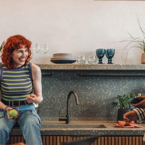 A perfect fit for the whole family a group of people sitting and talking