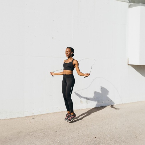 The essence of exceptional living a woman jump-roping